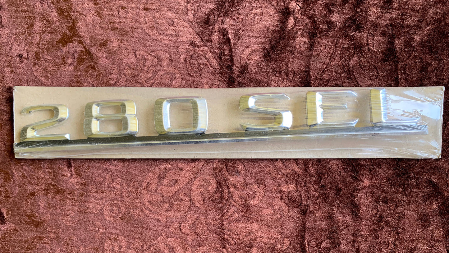 MERCEDES BENZ GENUINE REAR TRUNK BADGE 280SEL EMBLEM NAMEPLATE 1268170215